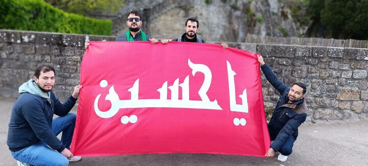 به اهتزاز درآوردن پرچم حرم امام حسین (ع) بر فراز کلیسای سنت میشل فرانسه + عکس و فیلم فرانسه